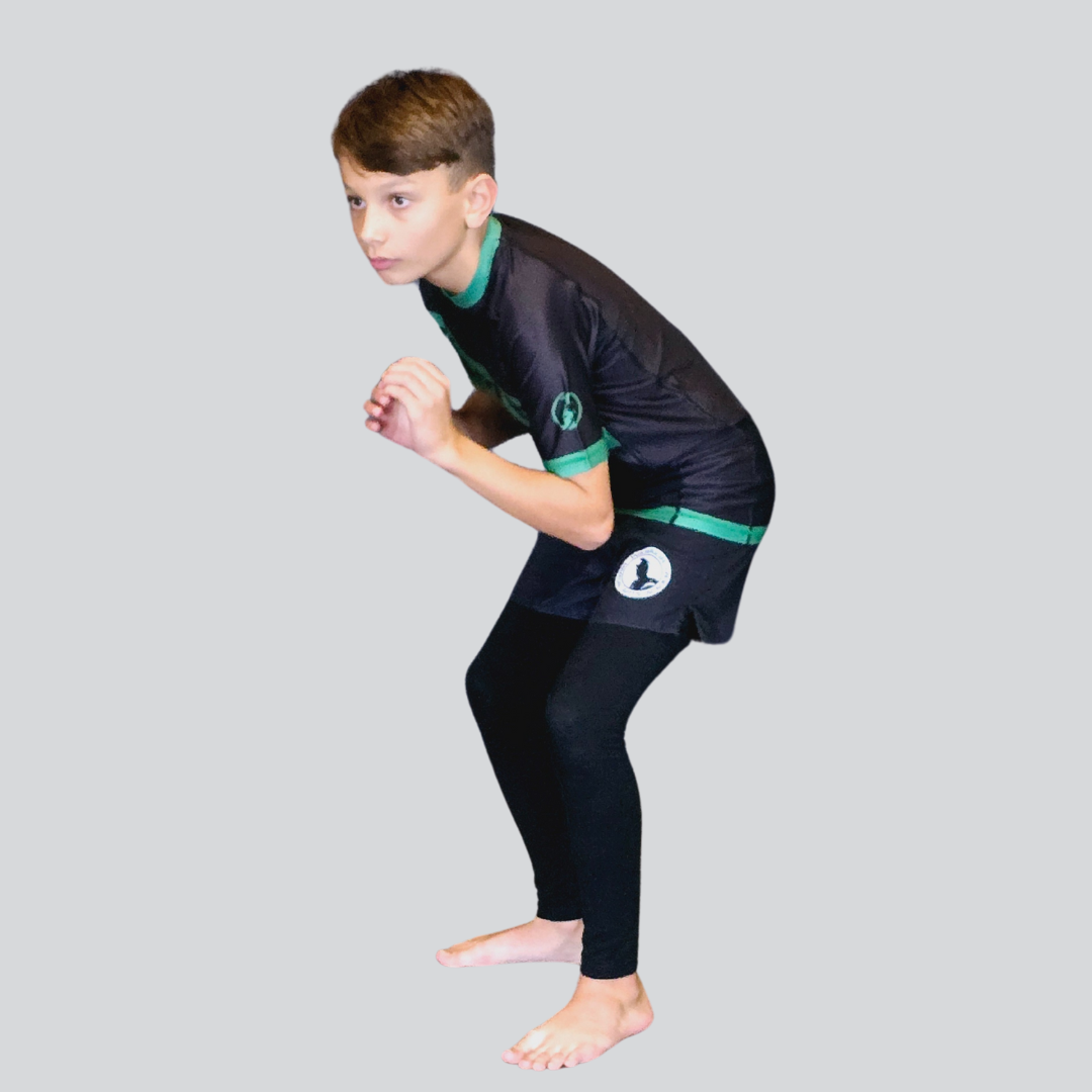 YOUTH H/S BLK/GREEN RASH GUARD